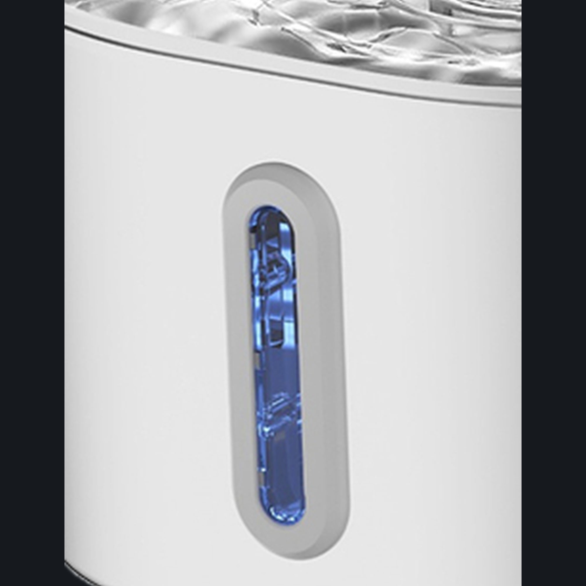 Close-up of the water-level window — check the level without lifting the lid